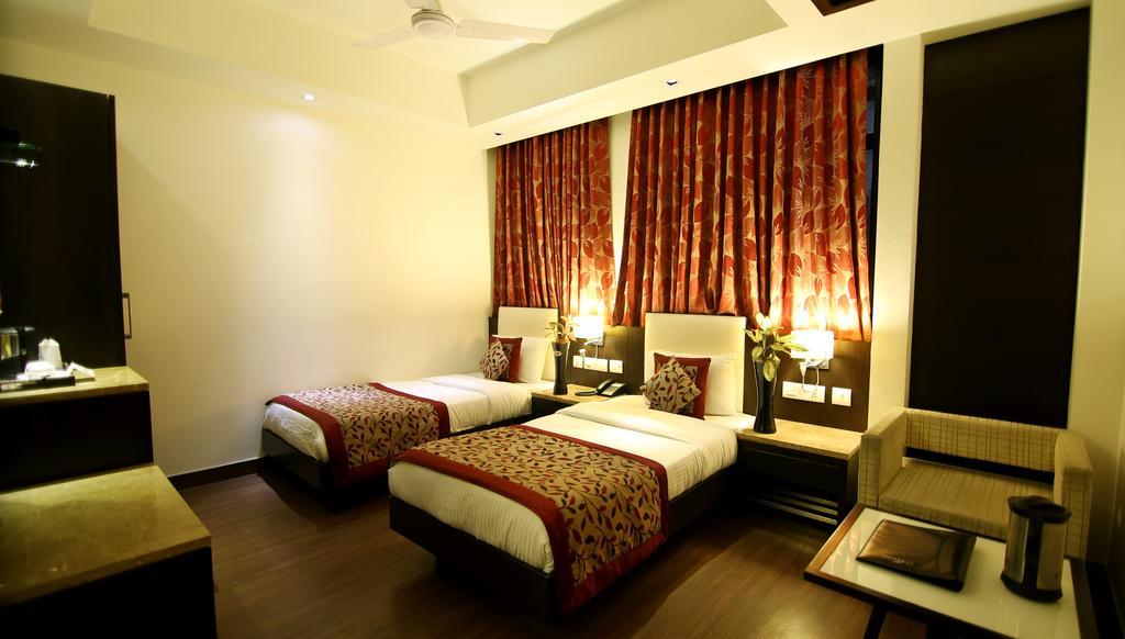 Отель The Prime Balaji Deluxe At New Delhi Railway Station - Free Airport Pickup Номер фото